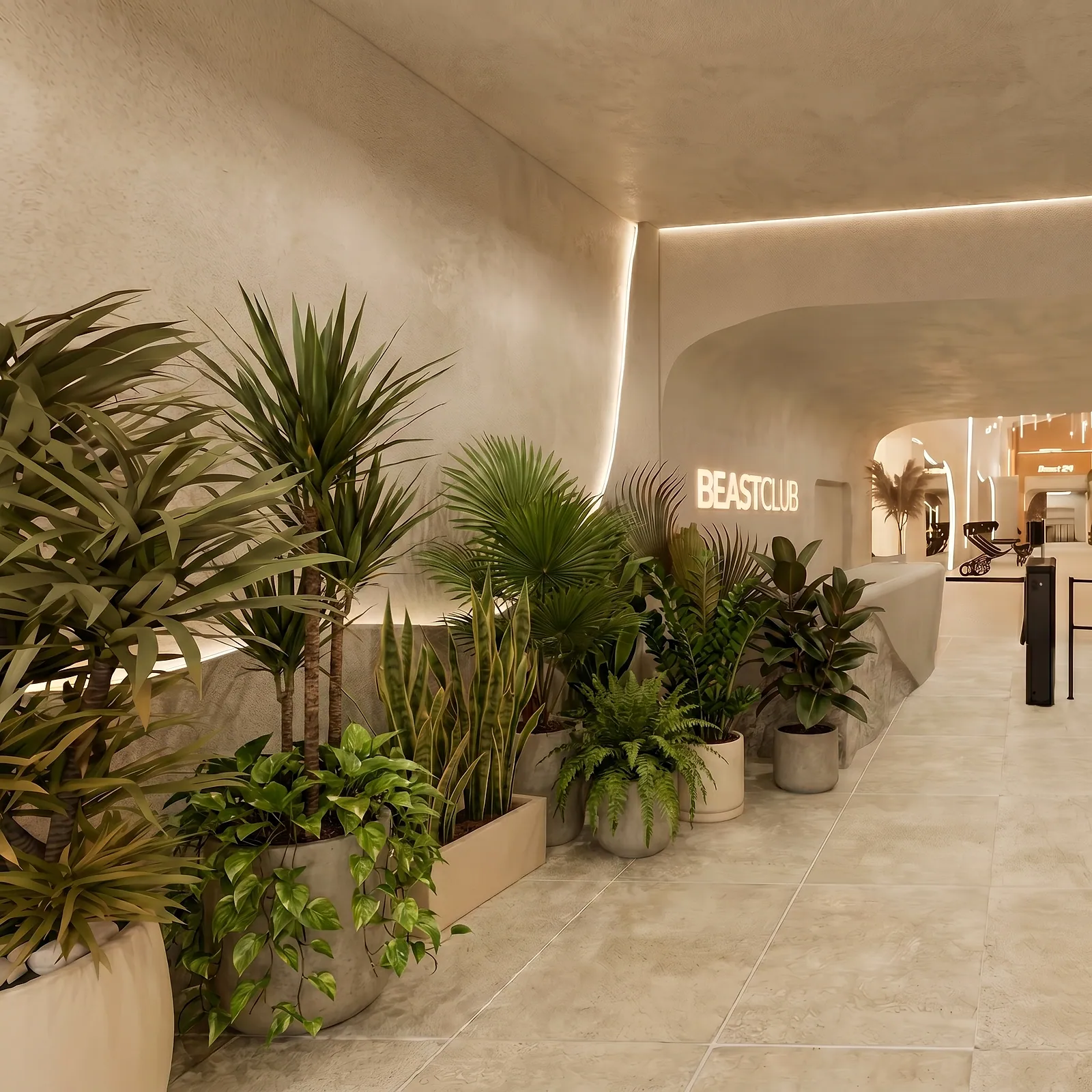 Recepción de Beastclub, con vegetación y luz cálida